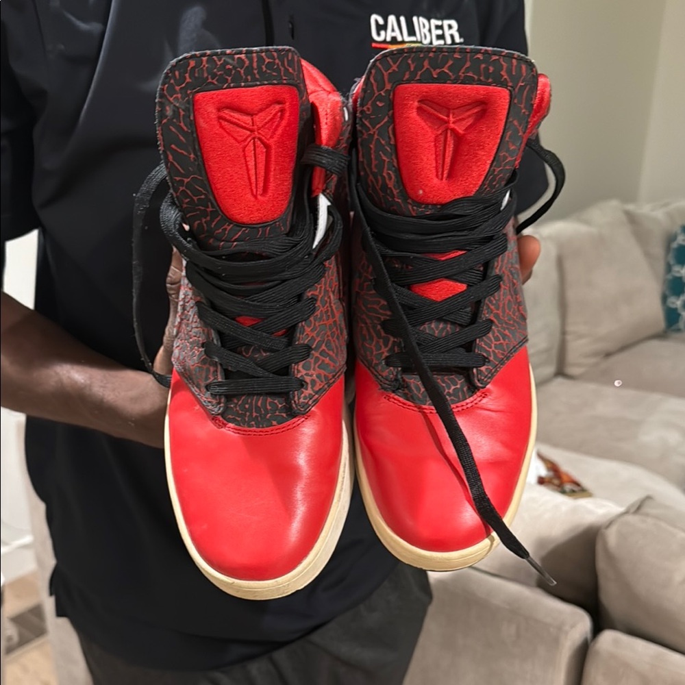 Nike Red and Black High-Top Sneakers with Iconic Design